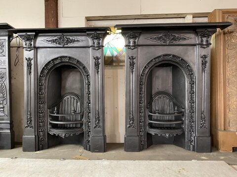 A pair of cast iron inserts