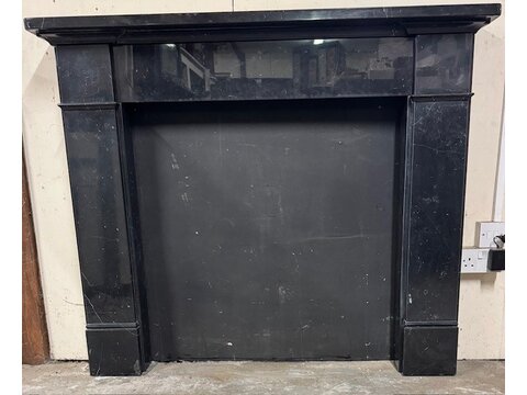 A Victorian style Nero Marquina fire surround FS502